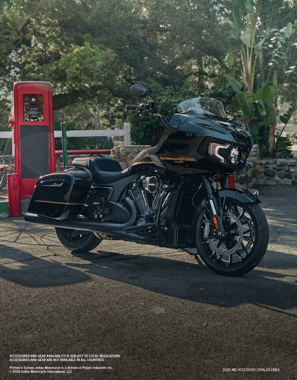A Harley Davidson motorcycle is parked in front of a gas station. AI generated content